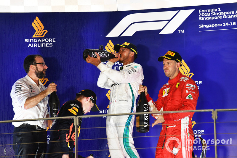 Max Verstappen, Red Bull Racing, Lewis Hamilton, Mercedes AMG F1 and Sebastian Vettel, Ferrari celebrate on the podium with the champagne
