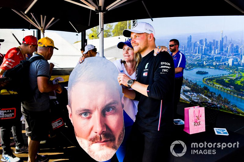 Valtteri Bottas, Mercedes AMG F1 poses for a photograph with a fan