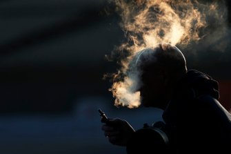 Rokende fotograaf