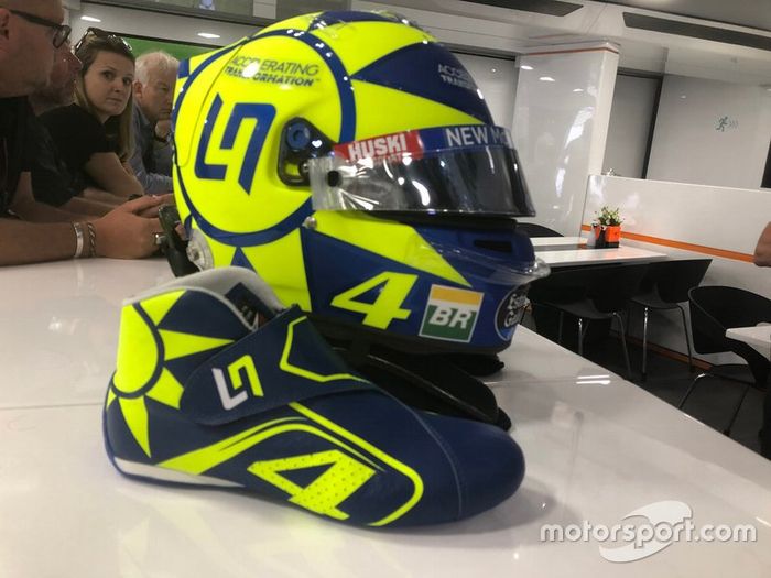 Helmet and boots of Lando Norris, McLaren with the colors of Valentino Rossi