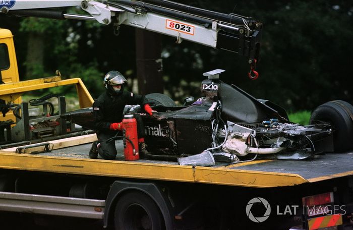 The wreckage of the Mika Salo, Arrows is bought back to the pits after his crash