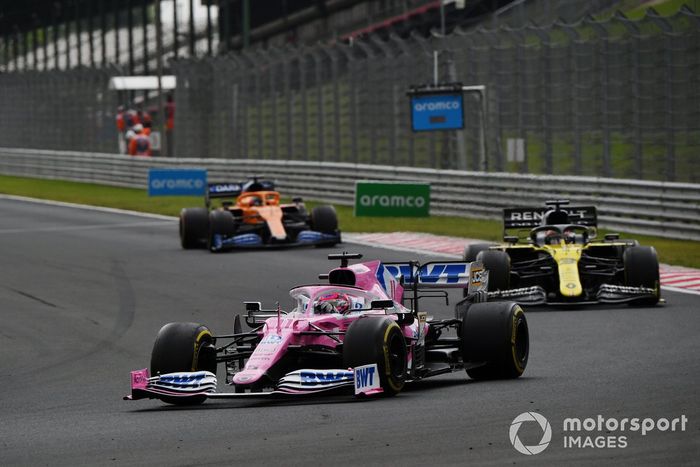 Sergio Perez, Racing Point RP20, leads Daniel Ricciardo, Renault F1 Team R.S.20, and Carlos Sainz Jr., McLaren MCL35