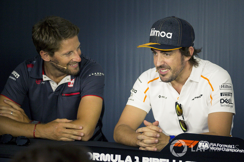 Romain Grosjean, Haas F1 y Fernando Alonso, McLaren