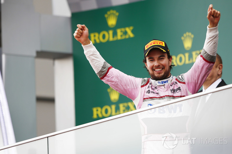 Sergio Perez, Force India, celebrates on the podium after the race