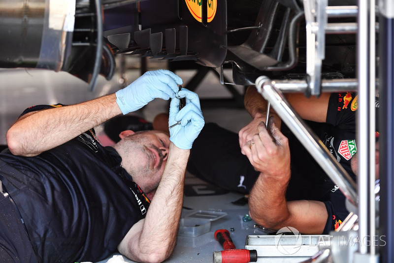 Red Bull Racing mechanics work on Red Bull Racing RB14