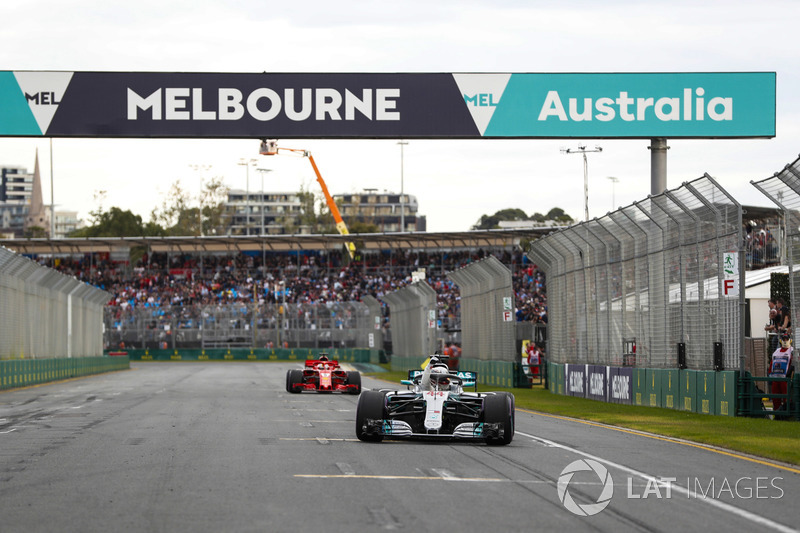 Lewis Hamilton, Mercedes AMG F1 W09, celebrates taking pole position on the pit straight