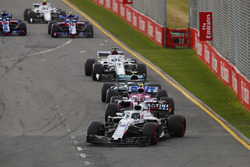 Lance Stroll, Williams FW41 Mercedes, leads Esteban Ocon, Force India VJM11 Mercedes, and Valtteri B
