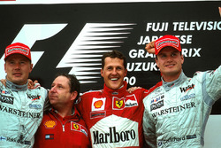 Podium: Mika Hakkinen second , Jean Todt, race winner Michael Schumacher, Ferrari F1 2000 and David Coulthard third