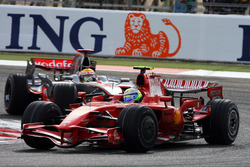 Felipe Massa, Ferrari F2008 leads Lewis Hamilton, McLaren MP4/23