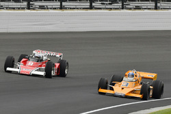 Johnny Rutherford, McLaren M16, and Mario Andretti, McLaren M24
