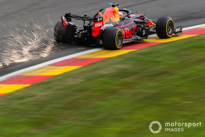 Sparks fly from the rear of Max Verstappen, Red Bull Racing RB16