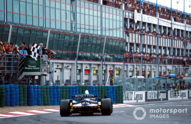 Race winner Michael Schumacher,  Benetton B195 takes the chequered flag