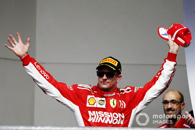 Kimi Raikkonen, Ferrari, 1st position, arrives on the podium