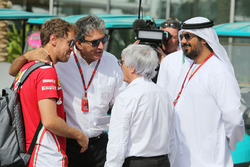 Sebastian Vettel, Ferrari con Pasquale Lattuneddu, y FOM and Bernie Ecclestone