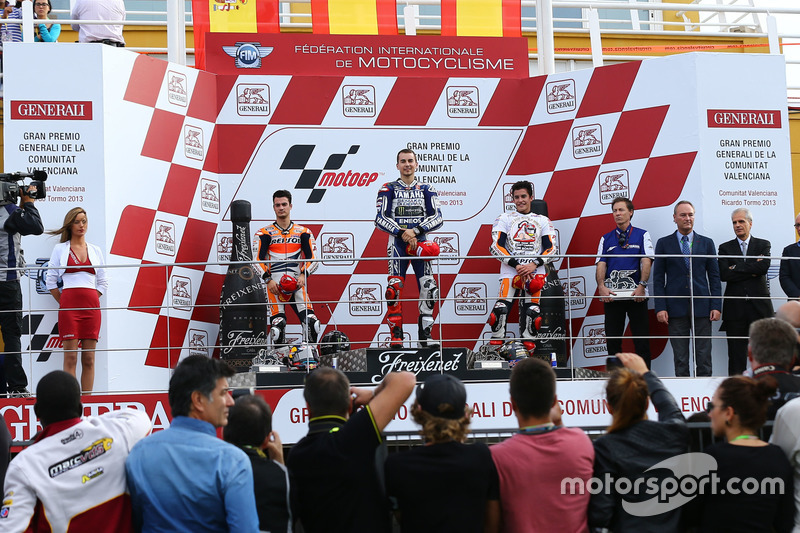 Podium: Race winner Jorge Lorenzo, Yamaha; second place Dani Pedrosa, Repsol Honda; third place Marc