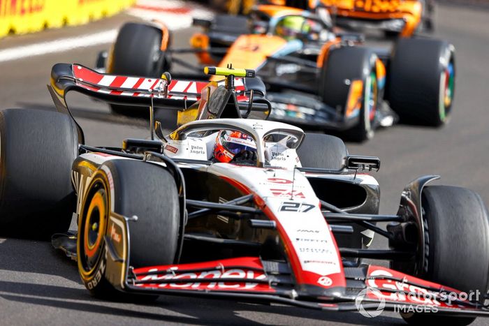 Nico Hulkenberg, Haas VF-23, Lando Norris, McLaren MCL60