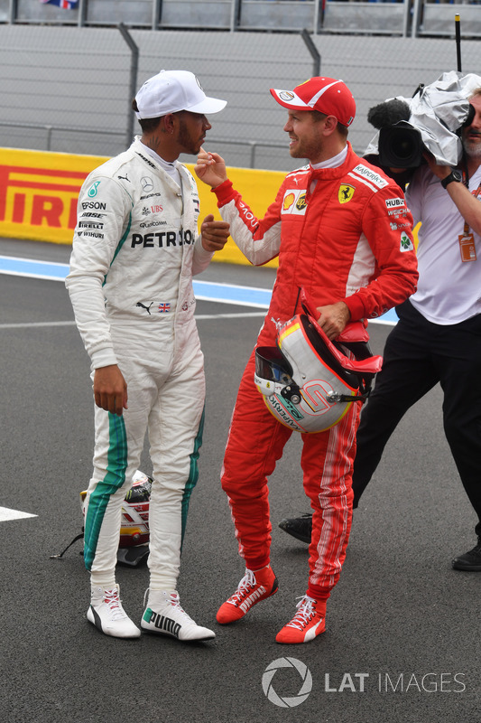 Lewis Hamilton, Mercedes-AMG F1 and Sebastian Vettel, Ferrari celebrate in parc ferme