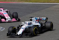 Lance Stroll, Williams FW41 Mercedes, leads Sergio Perez, Force India VJM11 Mercedes