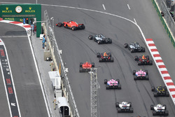 Sebastian Vettel, Ferrari SF71H leads at the start of the race