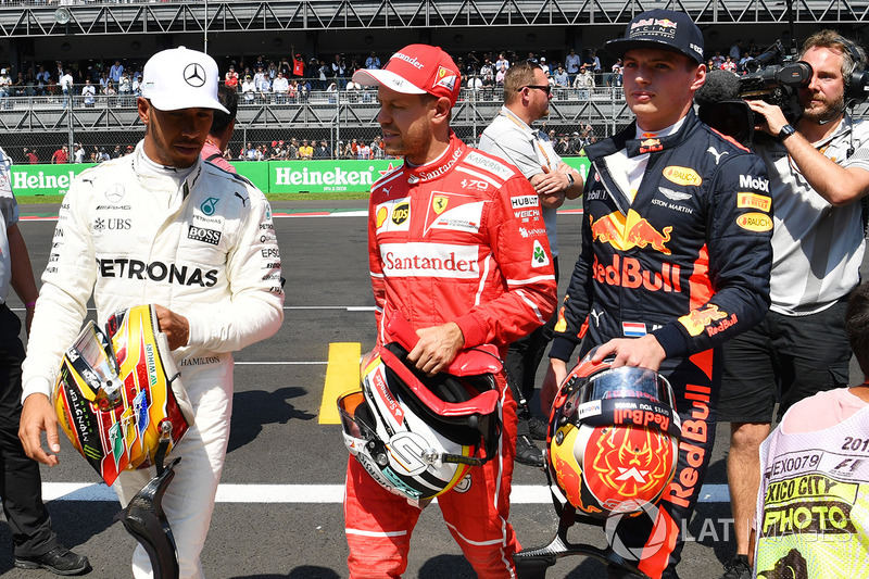 Lewis Hamilton, Mercedes AMG F1, pole sitter Sebastian Vettel, Ferrari and Max Verstappen, Red Bull Racing in parc ferme