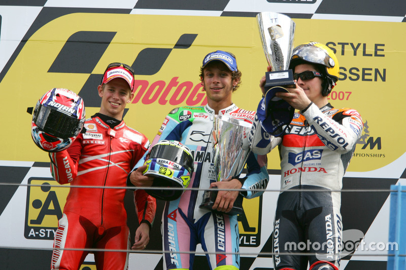 Podium: second place Cases Stoner, Ducati; Winner Valentino Rossi, Yamaha; third place Nicky Hayden, Honda