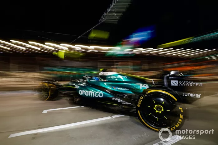 Fernando Alonso, Aston Martin AMR24, leaves the garage