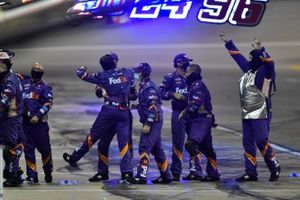 Joe Gibbs Racing crew celebrating Denny Hamlin's victory