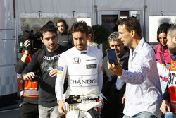 Fernando Alonso, McLaren, at the centre of attention