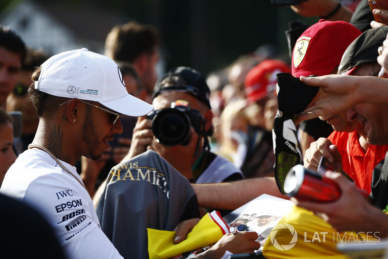Lewis Hamilton, Mercedes AMG F1, signs autographs for fans