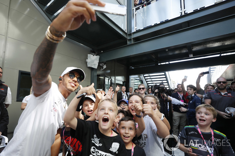 Lewis Hamilton, Mercedes AMG F1, meets the grid kids