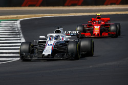 Lance Stroll, Williams FW41, leads Kimi Raikkonen, Ferrari SF71H