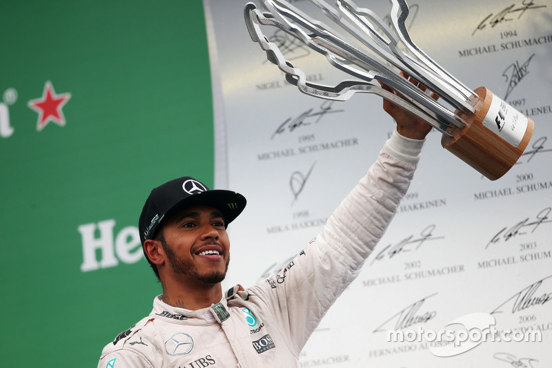 Race winner Lewis Hamilton, Mercedes AMG F1 celebrates on the podium