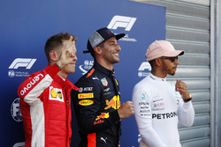 Pole setter Daniel Ricciardo, Red Bull Racing, celebrates with Sebastian Vettel, Ferrari, and Lewis Hamilton, Mercedes AMG F1