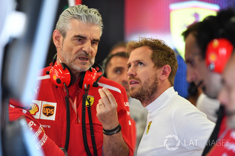 Sebastian Vettel, Ferrari e Maurizio Arrivabene, Team Principal Ferrari