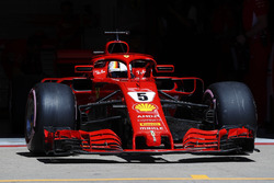 Sebastian Vettel, Ferrari SF71H, exits his pit garage