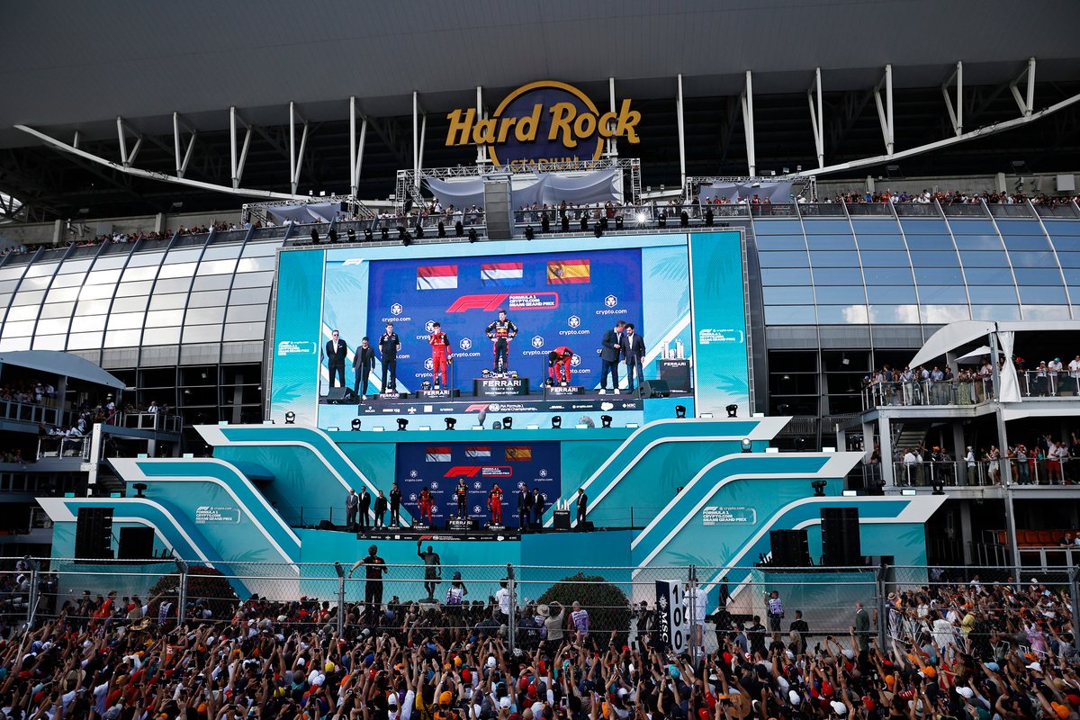 Charles Leclerc, Ferrari, 2nd position, Max Verstappen, Red Bull Racing, 1st position, Carlos Sainz, Ferrari, 3rd position, on the podium