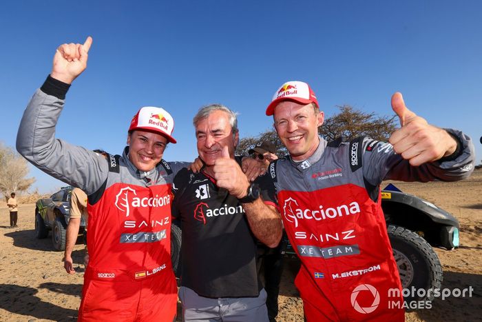 Laia Sanz, Sainz XE Team, and Mattias Ekstrom, Acciona | Sainz XE Team, 1st position, celebrate with Carlos Sainz, Sainz XE Team, after the race