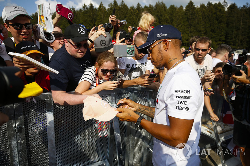 Lewis Hamilton, Mercedes AMG F1, signs autographs for fans