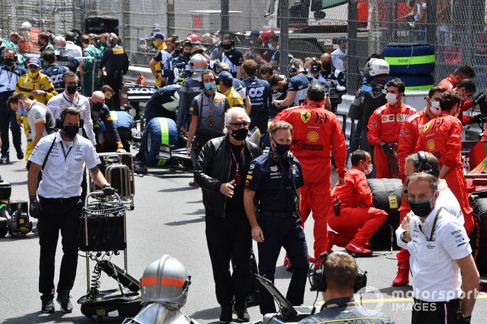 Flavio Briatore y Christian Horner, director del equipo Red Bull Racing, en la parrilla de salida