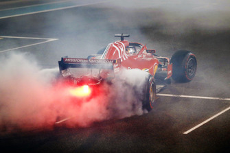 Sebastian Vettel, Ferrari SF71H, esegue dei donut sulla griglia di partenza, alla fine della gara