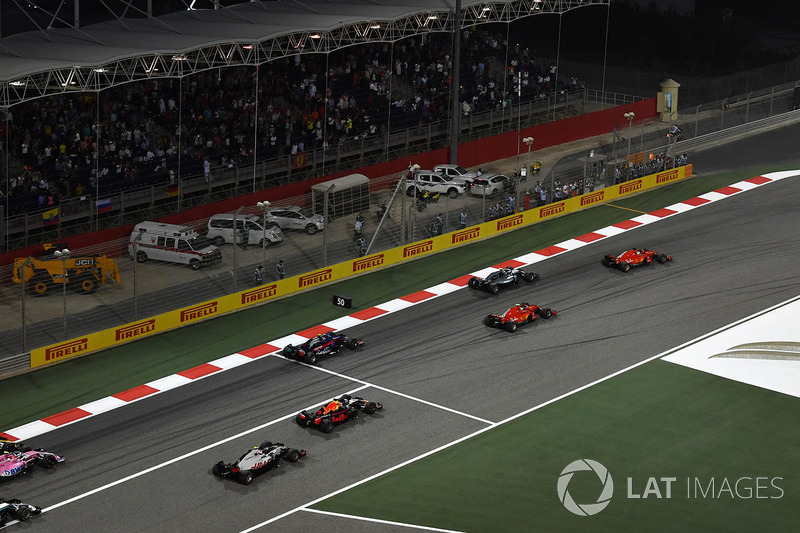 Sebastian Vettel, Ferrari SF71H leads at the start of the race