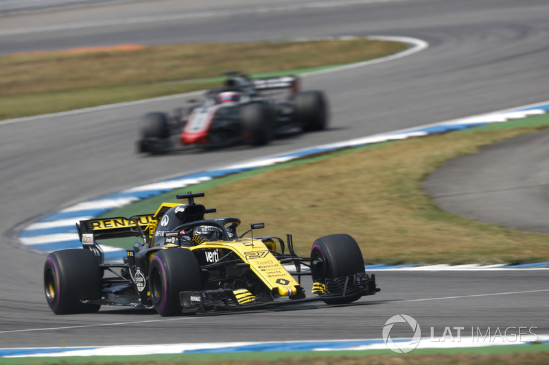 Hulkenberg passes two battling cars in one go