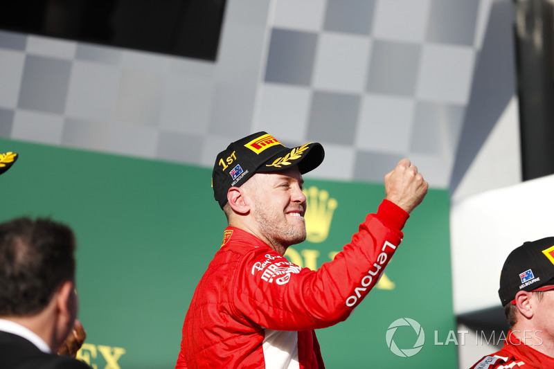 Sebastian Vettel, Ferrari, celebrates victory on the podium