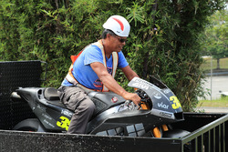 Marshal sits on Cal Crutchlow, Team LCR Honda crashed bike