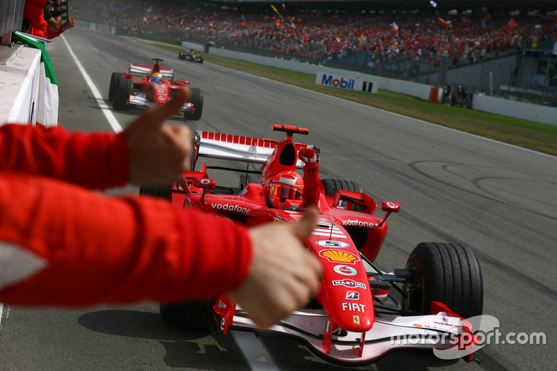 Race winner Michael Schumacher, Ferrari, second place Felipe Massa, Ferrari