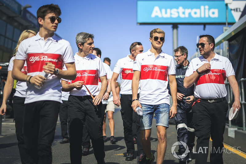 Charles Leclerc, Alfa Romeo Sauber F1 Team and Marcus Ericsson, Alfa Romeo Sauber F1 Team walk the t