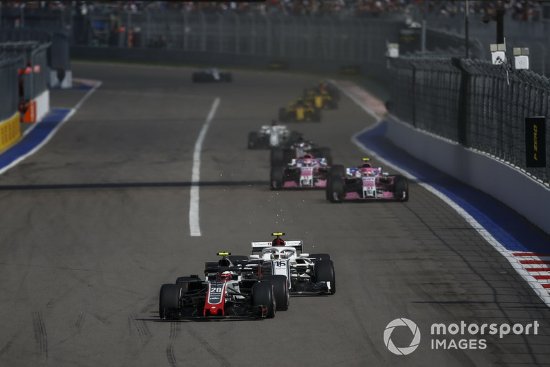 Kevin Magnussen, Haas F1 Team VF-18 and Charles Leclerc, Sauber C37