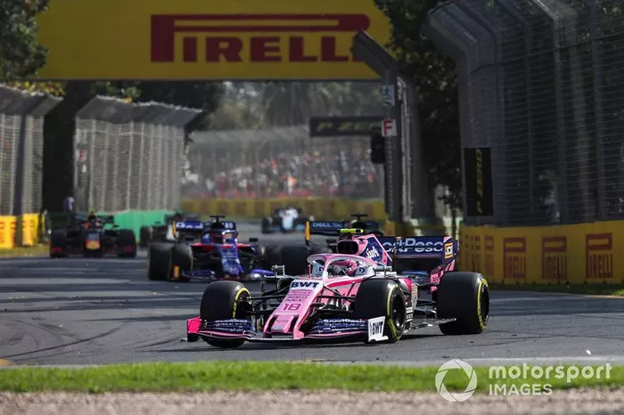 Lance Stroll, Racing Point RP19, Carlos Sainz Jr., McLaren MCL34, y Daniil Kvyat, Toro Rosso STR14