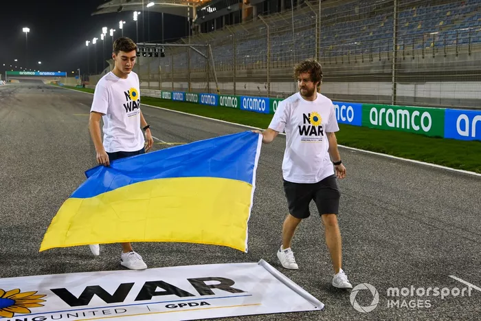 Sebastian Vettel, Aston Martin and George Russell, Mercedes-AMG, wear 