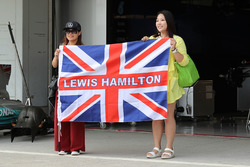 Lewis Hamilton, Mercedes AMG F1 fans and banner